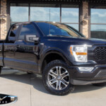 2021 Black Ford F150 with Rough Country Level on 20" Factory Wheels & 295/60R20 Toyo Open Country A/T II Tires 2021 Black Ford F150 with Rough Country Level on 20" Factory Wheels & 295/60R20 Toyo Open Country A/T II Tires