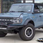 Area 51 Blue 2021 Ford Bronco with Addictive Desert Designs Rock Fighter Winch Front Bumper & Warn 12,000lb winch w/synthetic rope Area 51 Blue 2021 Ford Bronco with Addictive Desert Designs Rock Fighter Winch Front Bumper & Warn 12,000lb winch w/synthetic rope