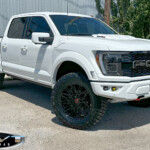 White 2024 Ford Raptor R with ReadyLift Level on 22x9.5 22x9.5 Vossen HF6-5 Wheels in Gloss Black & 37x12.50R22 Toyo Open Country R/T Trail Tires White 2024 Ford Raptor R with ReadyLift Level on 22x9.5 22x9.5 Vossen HF6-5 Wheels in Gloss Black & 37x12.50R22 Toyo Open Country R/T Trail Tires