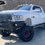 White Dodge Ram 2500 Lifted on 20x10 Moto Metal MO801 Phantom Wheels in Gloss Black & LT37x13.50R20 Venom Power Terra Hunter X/T Tires White Dodge Ram 2500 Lifted on 20x10 Moto Metal MO801 Phantom Wheels in Gloss Black & LT37x13.50R20 Venom Power Terra Hunter X/T Tires