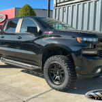 Black Chevrolet Silverado 1500 Trail Boss with 2" ReadyLift Lift on 20x9 Fuel Off-Road D700 Ammo Wheels in Matte Black & 295/55R20 Nitto Trail Grappler M/T Tires Black Chevrolet Silverado 1500 Trail Boss with 2" ReadyLift Lift on 20x9 Fuel Off-Road D700 Ammo Wheels in Matte Black & 295/55R20 Nitto Trail Grappler M/T Tires