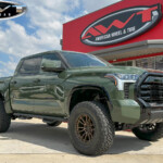 Green 2023 Toyota Tundra with 6" Readylift Lift on 20x10 Fuel Off-Road D681 Rebel 5 Wheels in Bronze & 37x12.50R20 Nitto Ridge Grappler Tires Green 2023 Toyota Tundra with 6" Readylift Lift on 20x10 Fuel Off-Road D681 Rebel 5 Wheels in Bronze & 37x12.50R20 Nitto Ridge Grappler Tires