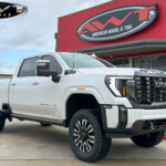 White 2024 GMC Denali HD 2500 with 3” Rough Country Lift on 295/65R20 Toyo Open Country R/T Tires White 2024 GMC Denali HD 2500 with 3” Rough Country Lift on 295/65R20 Toyo Open Country R/T Tires