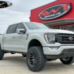 Avalanche Gray 2023 Ford F150 with 6" Rough Country Lift on 22x12 Fuel Off-Road Rebel 6 Wheel & 35" Mickey Thompson Baja Boss Tires Avalanche Gray 2023 Ford F150 with 6" Rough Country Lift on 22x12 Fuel Off-Road Rebel 6 Wheel & 35" Mickey Thompson Baja Boss Tires
