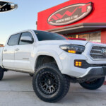 White Toyota 2020 Tacoma on 17x9 Dirty Life Enigma Pro 9311 Wheels in Matte Black & 285/70R17 Toyo Open Country A/T III Tires White Toyota 2020 Tacoma on 17x9 Dirty Life Enigma Pro 9311 Wheels in Matte Black & 285/70R17 Toyo Open Country A/T III Tires