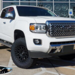 White 2020 GMC Canyon with 4” Rough Country Lift on 18" Vision 349 Savage Wheels & 285/65R18 Nitto Recon Grappler A/T Tires White 2020 GMC Canyon with 4” Rough Country Lift on 18" Vision 349 Savage Wheels & 285/65R18 Nitto Recon Grappler A/T Tires