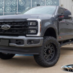 Gray 2024 Ford F250 with 5" BDS Lift on 22x10 Vision 412 Rocker Wheels & LT37x12.50R22 Nitto Ridge Grappler Tires Gray 2024 Ford F250 with 5" BDS Lift on 22x10 Vision 412 Rocker Wheels & LT37x12.50R22 Nitto Ridge Grappler Tires