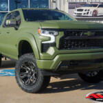 Green 2023 Chevrolet Silverado 1500 Black Widow with 6" Rough Country Lift on 35x12.50R20 Nitto Recon Grappler Tires Green 2023 Chevrolet Silverado 1500 Black Widow with 6" Rough Country Lift on 35x12.50R20 Nitto Recon Grappler Tires