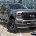 Carbonized Gray 2024 Ford F250 with 5" BDS Lift on 22x12 Vision 412 Rocker Wheels & LT37x13.50R22 Nitto Ridge Grappler Tires Carbonized Gray 2024 Ford F250 with 5" BDS Lift on 22x12 Vision 412 Rocker Wheels & LT37x13.50R22 Nitto Ridge Grappler Tires