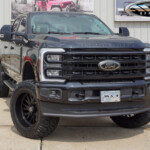 Black 2024 Ford F250 with 5" BDS Lift on 22x12 TIS 547B Wheels & LT37x13.50R22 Nitto Ridge Grappler Tires Black 2024 Ford F250 with 5" BDS Lift on 22x12 TIS 547B Wheels & LT37x13.50R22 Nitto Ridge Grappler Tires